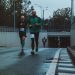 group of people running on street